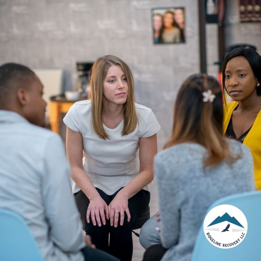 A group therapy session in Addiction Therapy Services, highlighting the shared experiences and support among individuals in early recovery.