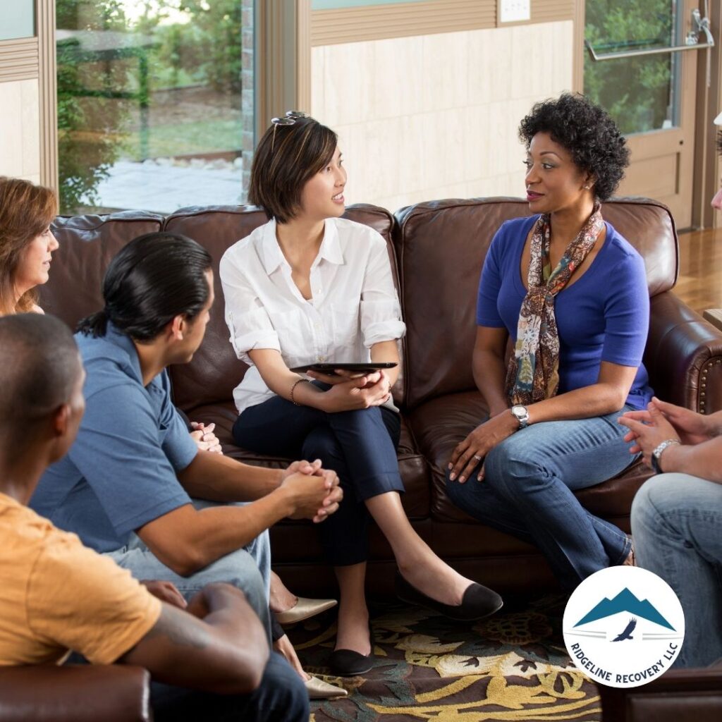 A group therapy session showcasing diverse individuals benefiting from Addiction Therapy Services for alcohol and drug recovery.