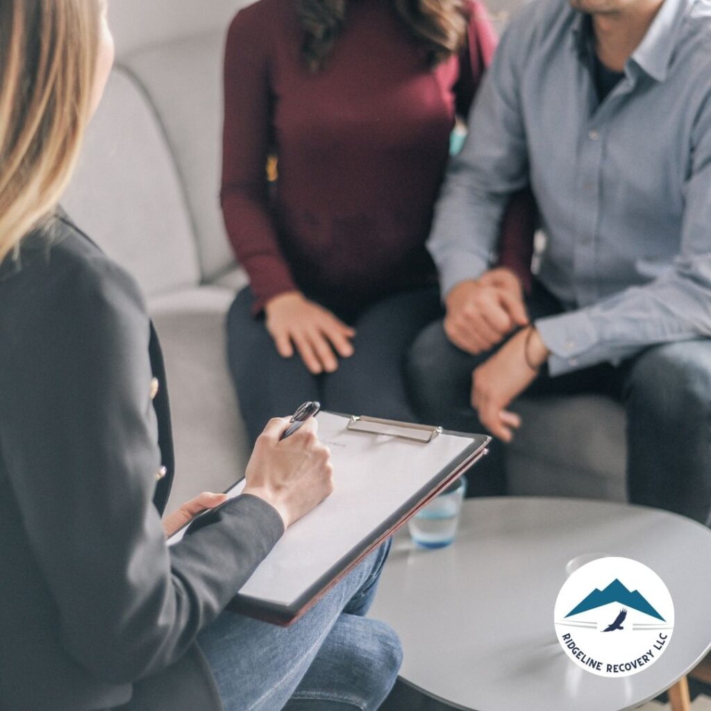 Participants actively engaging in a group discussion during Addiction Therapy Services aimed at overcoming substance abuse.