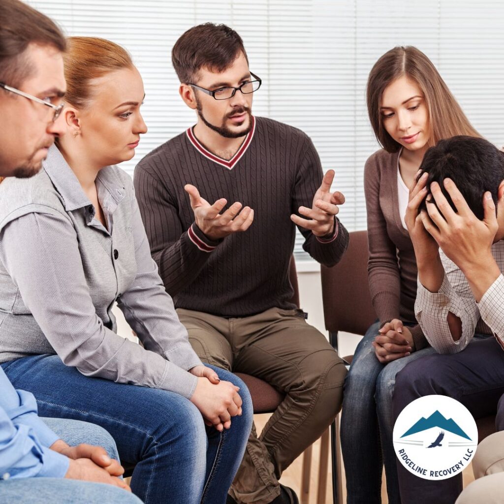 A group therapy session focused on addiction treatment, fostering connection and support among participants.