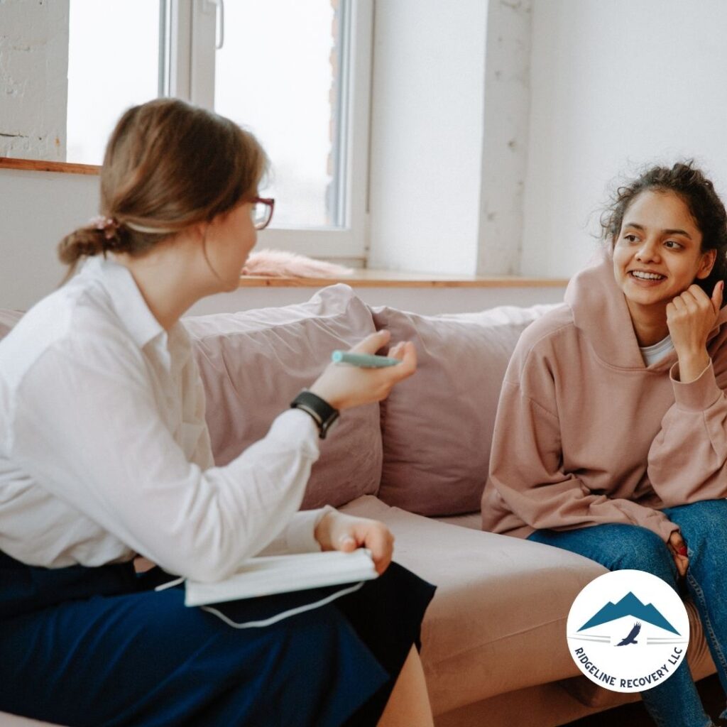 A nutritionist discussing a healthy meal plan as part of Addiction Therapy with a client.