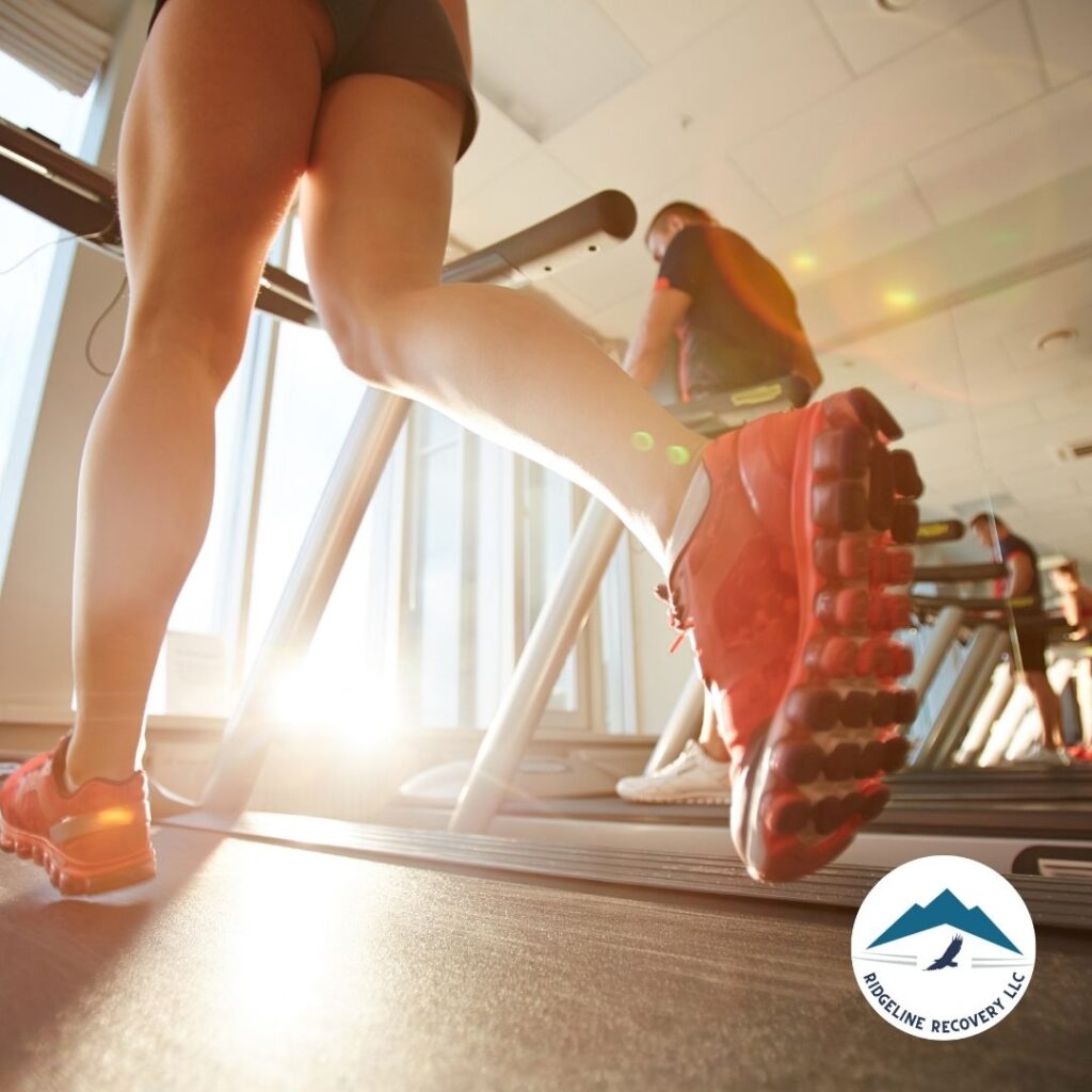 A woman working out on a treadmill at the Columbus Center as part of her addiction recovery program.