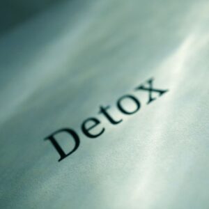 The word "Detox" printed on a page, symbolizing the importance of Ambulatory Detox for a safe and structured addiction recovery journey.