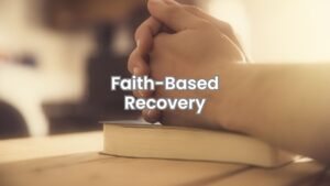 Individual in quiet reflection during faith-based recovery in Columbus.