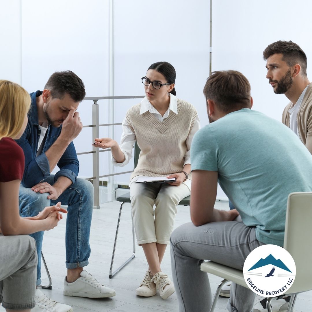 A group of individuals participating in a collaborative group counseling session as part of addiction treatment in Columbus.