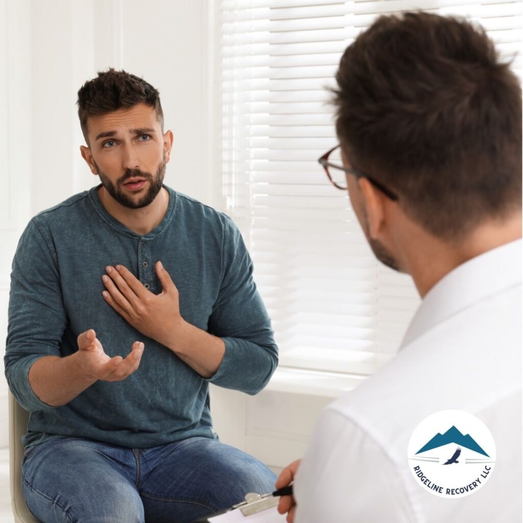 A counselor and patient engaged in a focused one-on-one counseling session during addiction treatment in Columbus.