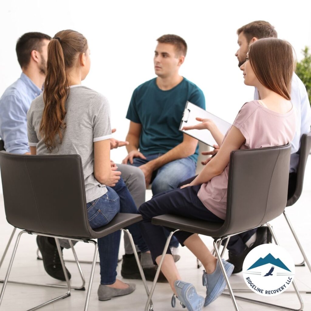 A counselor explaining effective recovery strategies to a patient at an addiction treatment center in Columbus.