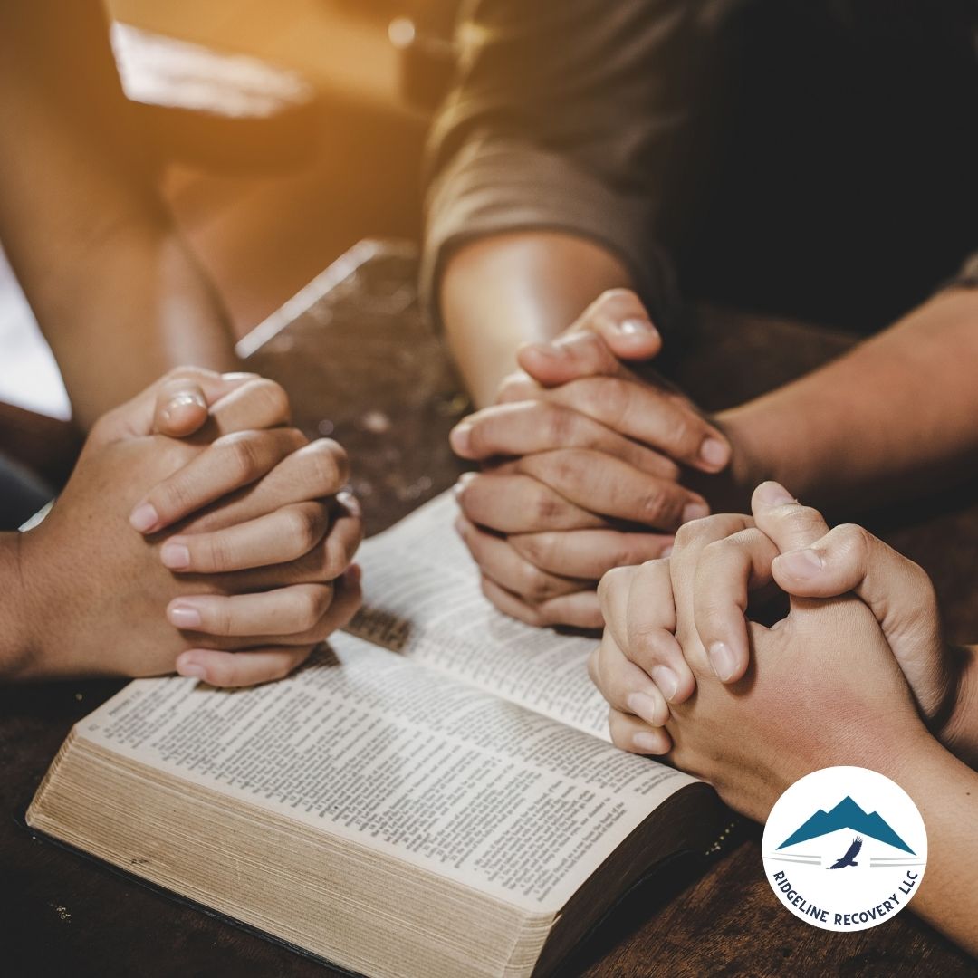 A group participating in a faith-based recovery session at a Christian addiction treatment center in Columbus.