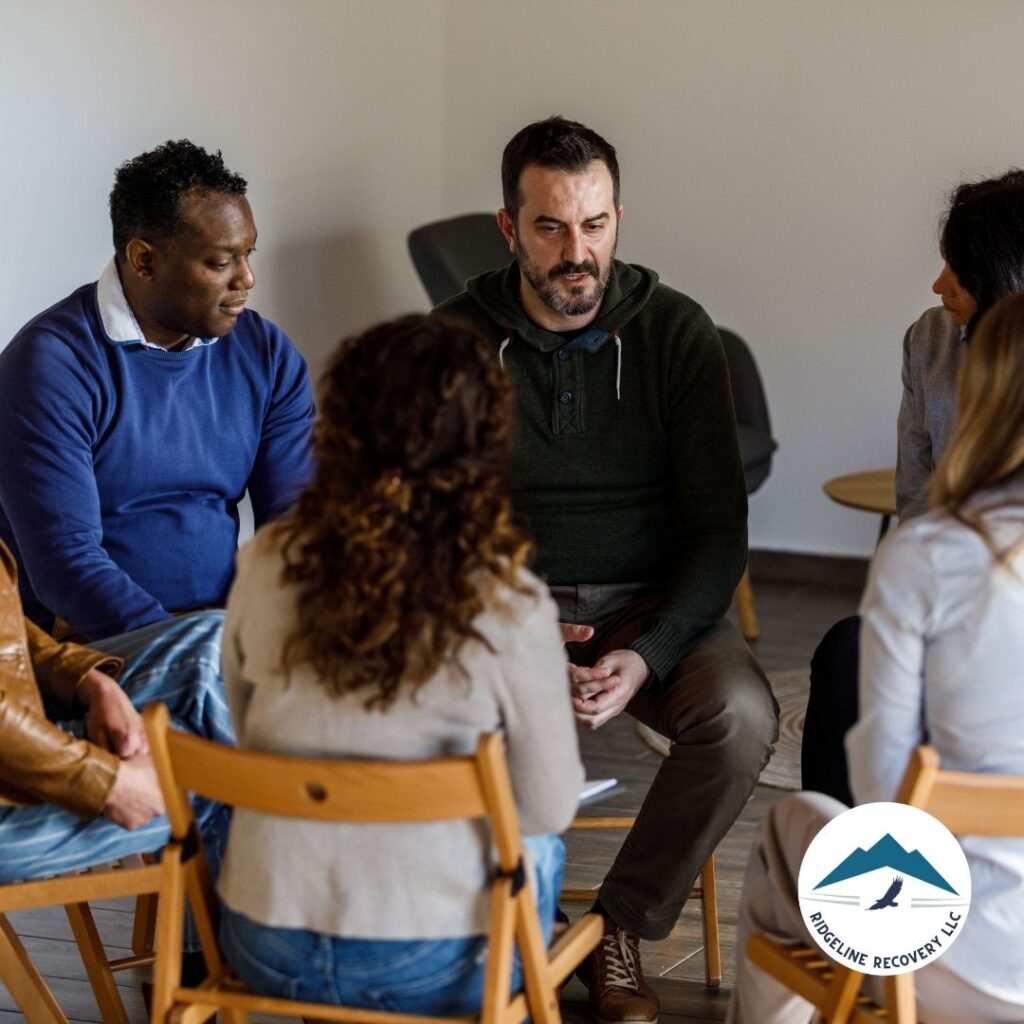 A family participating in a discussion on the impact of addiction and recovery at an addiction treatment center in Columbus.