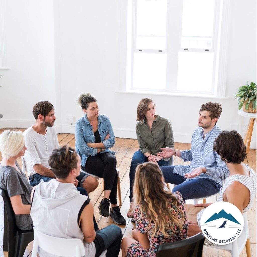 A group therapy session at a Columbus addiction treatment center, where participants share experiences and support each other in overcoming alcohol dependency.