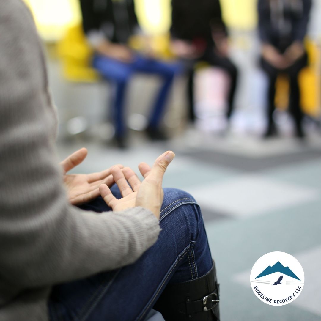 A group of individuals in a workshop on innovative recovery strategies at an addiction treatment center in Columbus.