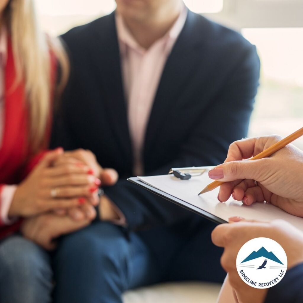 A healthcare professional reviewing a patient's progress in a comprehensive alcohol and drug recovery program at an addiction treatment center in Columbus.