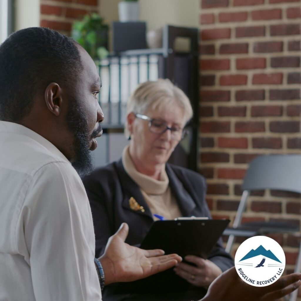 A counselor and patient in a private therapy session as part of addiction treatment in Columbus.