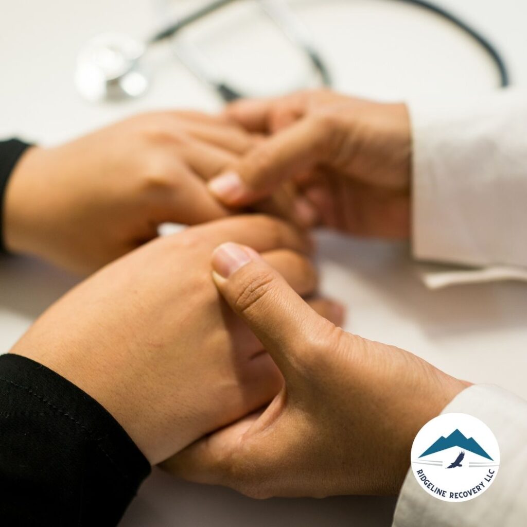 A counselor guiding a patient through a personalized alcohol and drug recovery plan at an addiction treatment Columbus center.