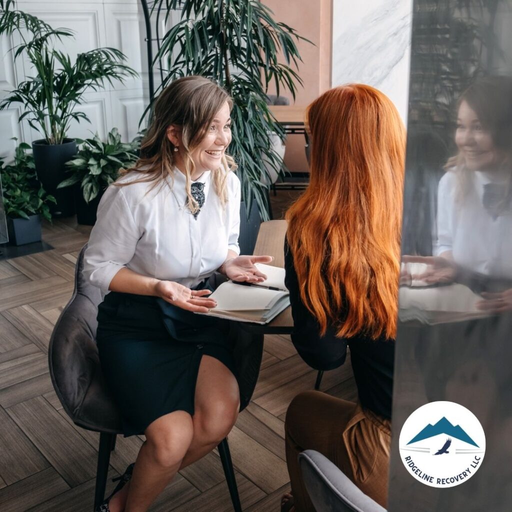 A therapist conducting a session with a patient experiencing co-occurring disorders during Addiction Therapy.