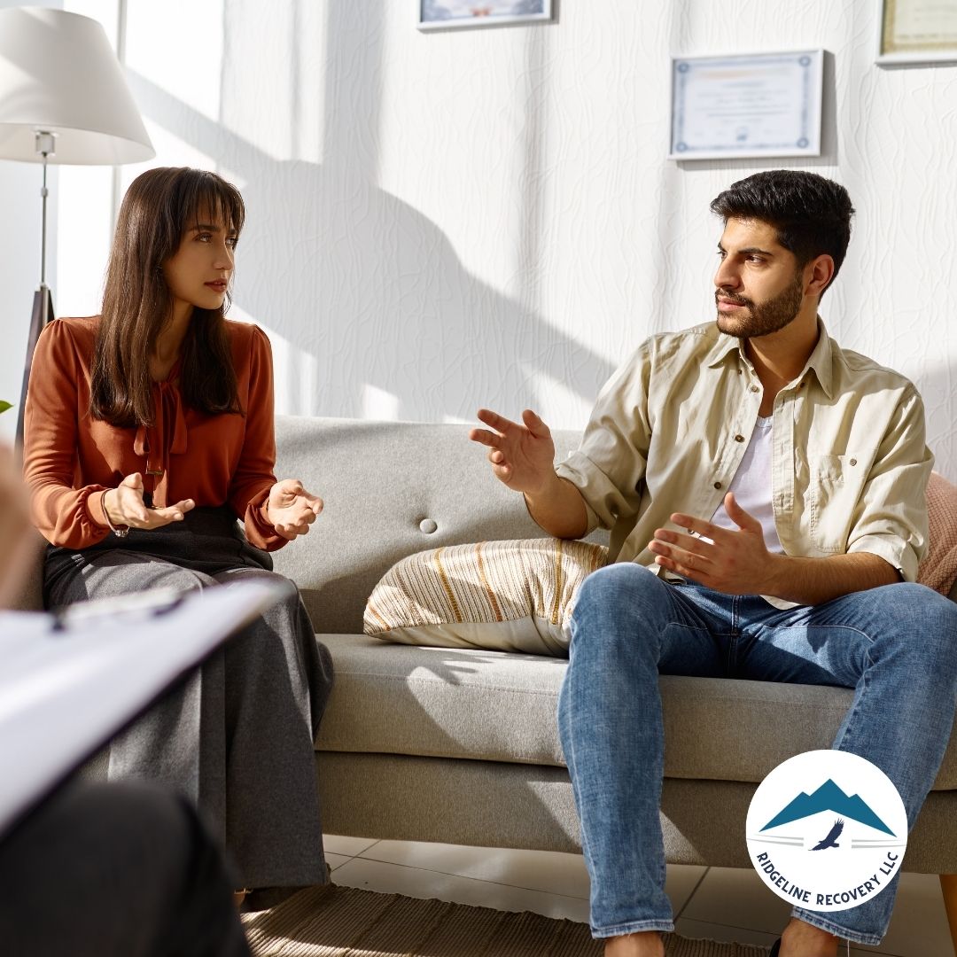 A therapist discussing a personalized treatment plan with a client in Addiction Therapy Services, focusing on tailored strategies for success.