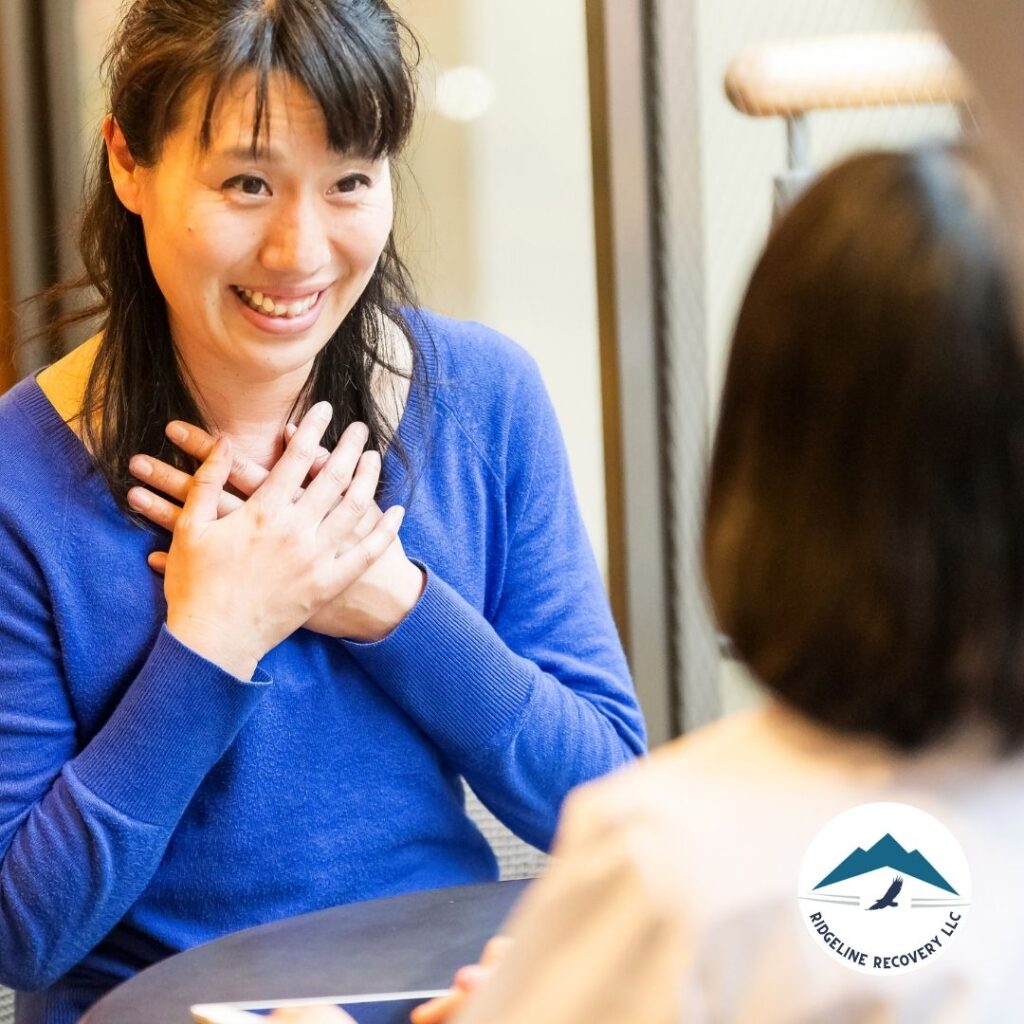 A medical professional explaining medication options to a patient in an Addiction Therapy program, focusing on medical treatment.