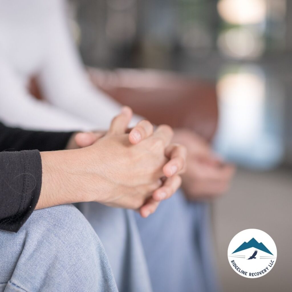 A therapist guiding a client through a session of addiction therapy, highlighting the supportive environment.