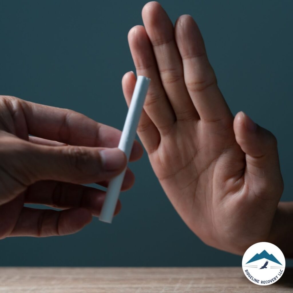 A person refusing a cigarette, symbolizing the decision to seek addiction treatment and embrace a healthier lifestyle in Columbus, Ohio. Addiction Treatment Columbus