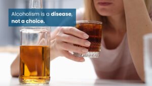 A woman sits with a glass of alcohol, highlighting the causes of alcoholism and how alcoholism is rooted in disease rather than personal choice.