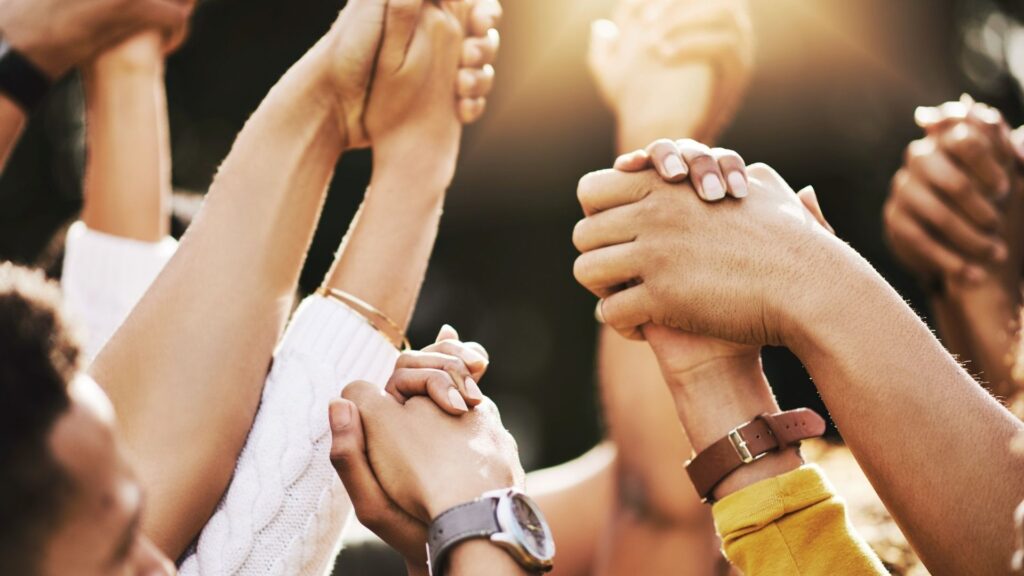 Group of individuals in a peer support services circle sharing experiences in Columbus.