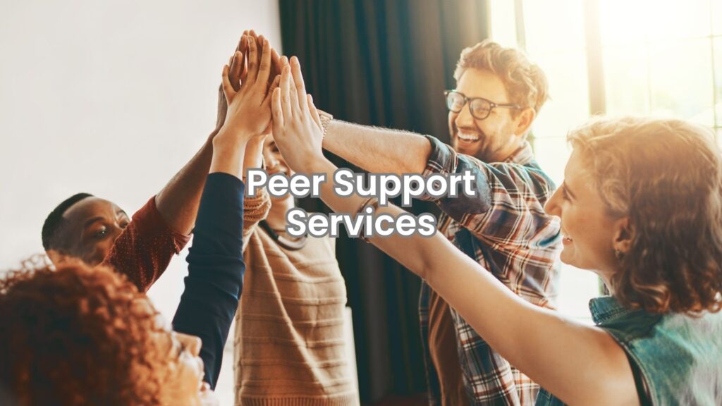 Group of individuals sharing stories in a peer support services session in Columbus.