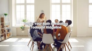 Group of individuals chatting and supporting each other in a drug and alcohol rehab session.